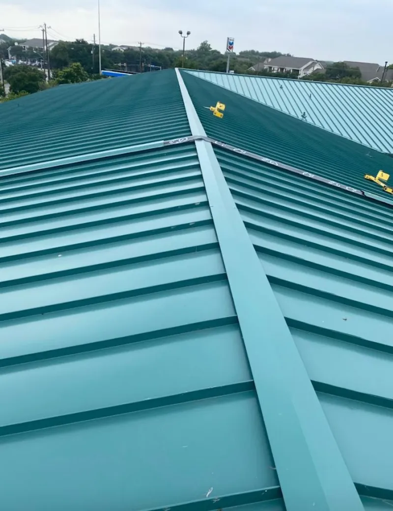 Green commercial metal roof ridge and valley for Metal Roof Repair in West Slope